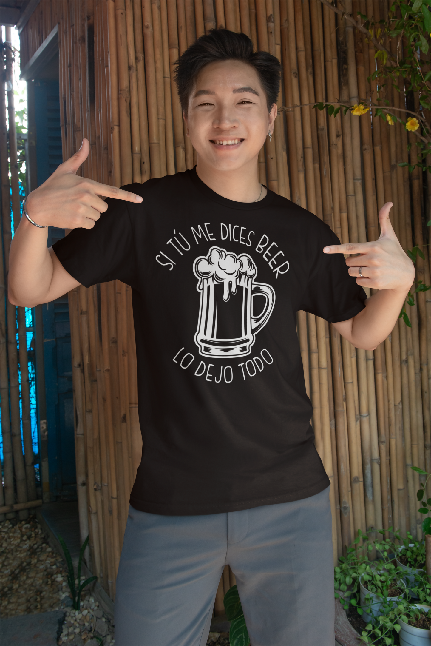 bella-canvas-mockup-featuring-a-smiling-man-pointing-at-his-round-neck-t-shirt-m40234
