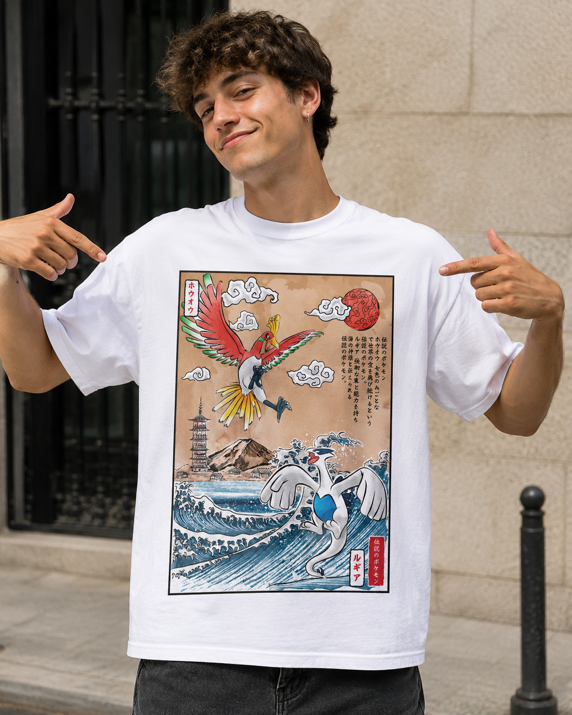 Camiseta blanca con estampa ukiyo-e de Ho-Oh volando sobre una pagoda y Lugia emergiendo de una gran ola, diseño de DRMONEKERS